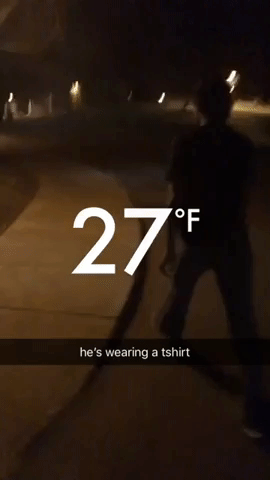 A friend walking around in a t-shirt