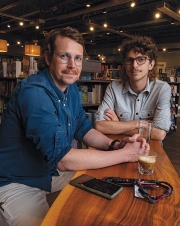 A photo of professor Jonathan Phillips and student Eli Hecht '23 at Still North Books