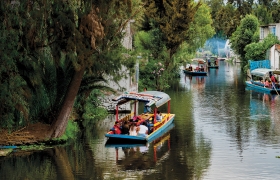 A photo of boats at Xochimilco Ecological Park and Plant Market in Mexico