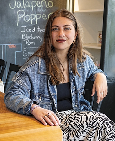 A photo of Armita Mirkarimi '25 sitting in The Nest