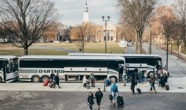 A photo of busses in front of the Hopkins Center
