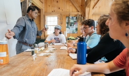A photo of an environmental studies class at the organic farm