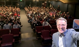 A photo of Dean Lee Coffin taking a selfie with members of the Class of 2023 during 2nd Dimensions