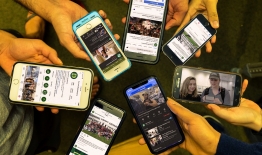 An image of various phones with social media on the screen
