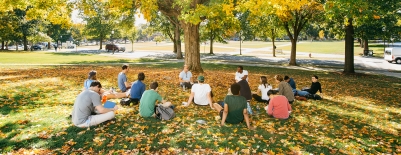 Photo of students having class in front of Dartmouth Hall