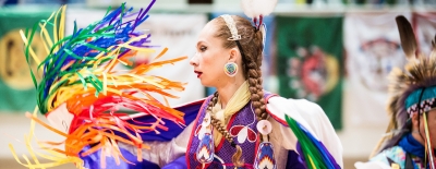 Photo of a student during the annual Powwow event