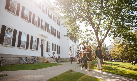 A photo of students walking in front of Dartmouth Hall
