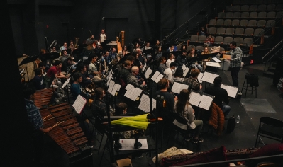  A photo of the Dartmouth College Wind Ensemble rehearsing in prepartion for a concert in Boston.