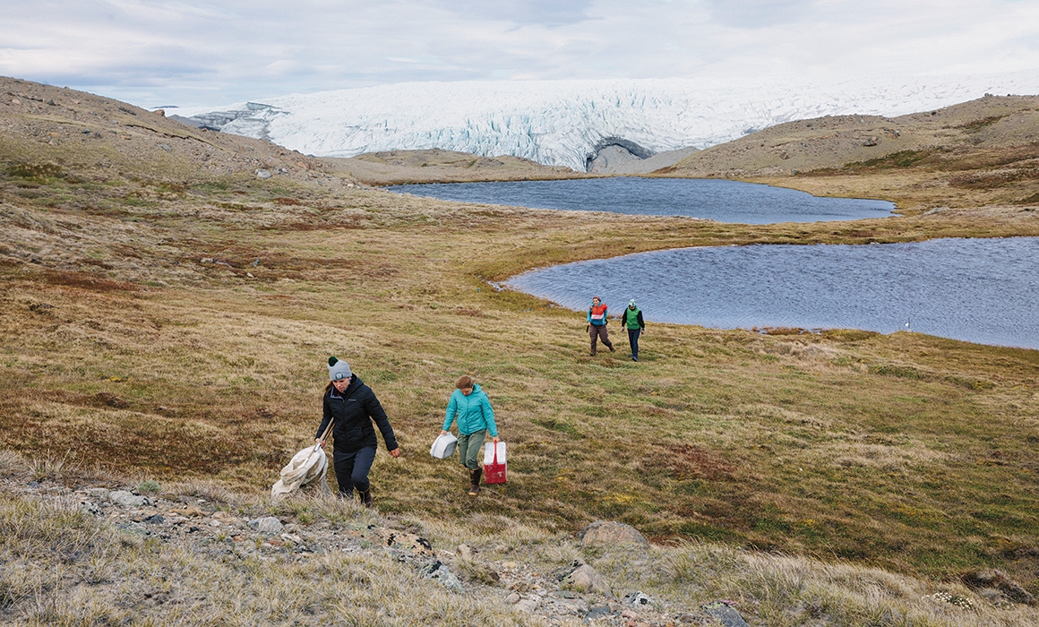 A photo of students from the Institute for Arctic Studies conducting field research in Greenland