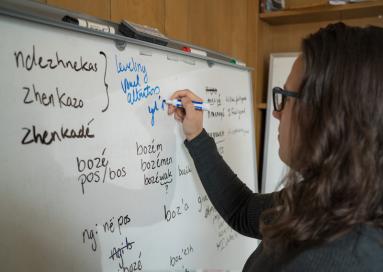 A photo of a student designing teaching tools to preserve her native language 