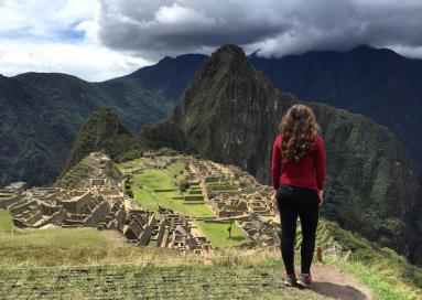 A students stands about Machu Picchu in Peru