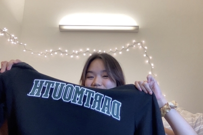 Me holding a Dartmouht Hoodie