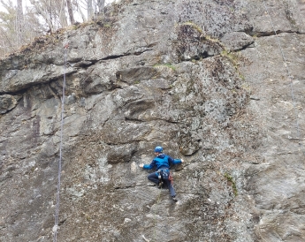 The image presented is of me climbing in a blue jacket, and dark pant's 30 feet about ground