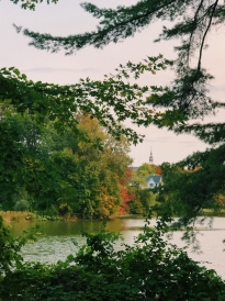 A picture of Baker Berry's bell tower from Occom Pond