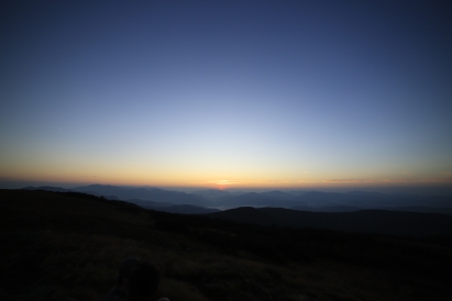 A beautiful sun rise shining over New Hampshire peaks. 