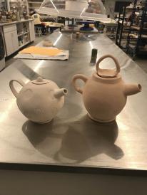 Two tea pots by Carlos