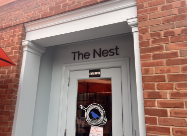 Entryway of the Nest; door in baby blue.