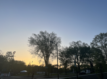 View of sunset; the sky is an ombre of orange and blue