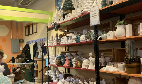 Shelves stacked with pottery