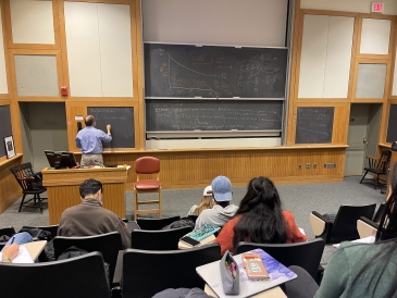 Professor Staiger draws some graphs on the board during ECON 39: International Trade.