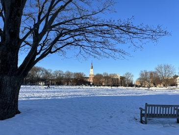 A landscape shot of the Green blanketed with white snow on a warm winter afternoon