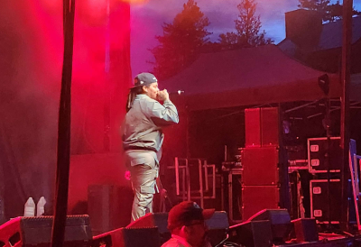 Young MA performing on stage