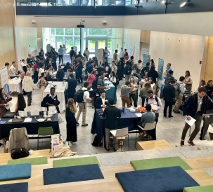 A panoramic view of an engineering career fair at Dartmouth's Computer Engineering and Science Center.