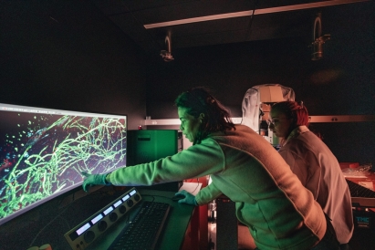 A man doing research on an aquarium