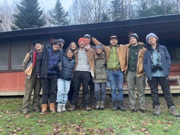 the grant company: eleven students gathered in front of the cabin