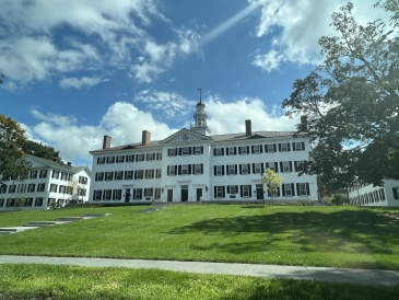 A picture of Dartmouth Hall, a large, white building from the street