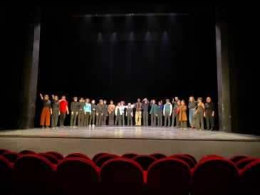 A picture at the end of a play I watched of the actors bowing.