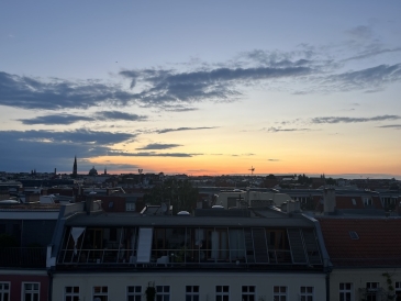 An image of a sunset from a rooftop in Berlin