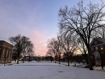 Sunset on the Green with snow on the ground