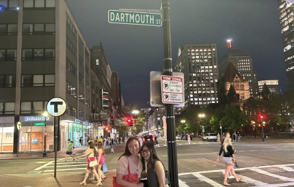 Diana and Sydney standing in front of Dartmouth Street sign in Boston