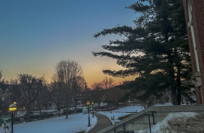 photo of a blue and orange ombre sunset near Alumni Gym in Hanover