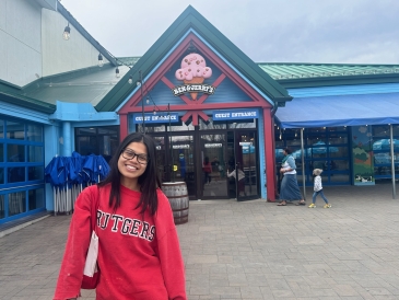 Diana posing in front of the Ben and Jerry's factory in Vermont