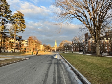 A photo of Tuck Drive during sunset. Baker Tower is visible at the end of the road.