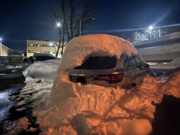 My car buried in snow!