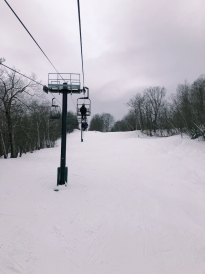 A picture of the chairlift while I rode on it.