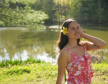 Lili in front of Occom Pond.