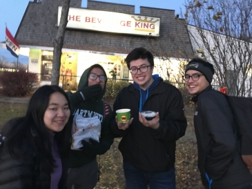 Gabe and his friends eating chips and queso