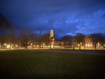 Image of Baker Library taken at night from the Green.