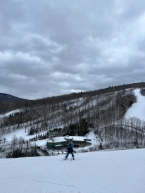A view of the ski lodge from the top of Holt's ledge on a snowy day