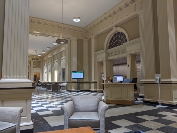 Inside Baker-Berry Library at the main desk in the quiet of night. 