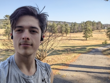 Me standing on a hill at the old Hanover Country Club taking a selfie. 