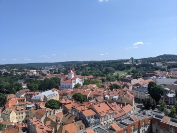 Panoramic view of the Old Town in Vilnius, Lithuania with red-bricked buildings and a beautiful sky