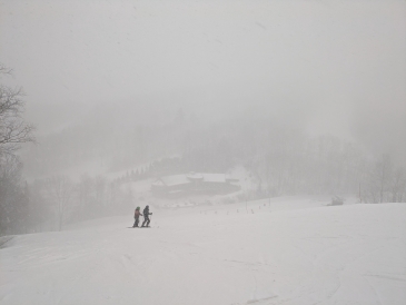 A picture from the western slopes at Dartmouth skiway of the lodge during a whiteout snow squall