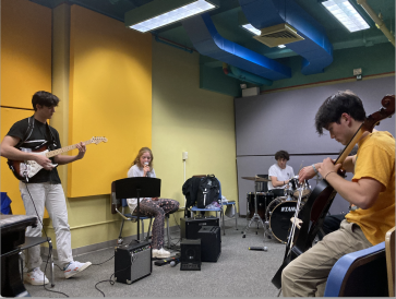 The band practicing in a studio at The Hop The band practicing in a studio at The Hop