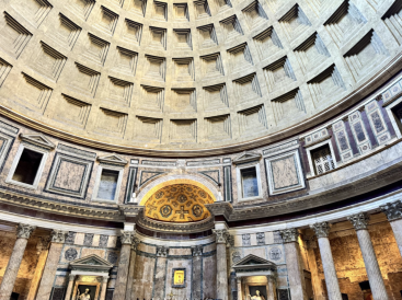 The interior of the Pantheon, from a low angle pointing up.