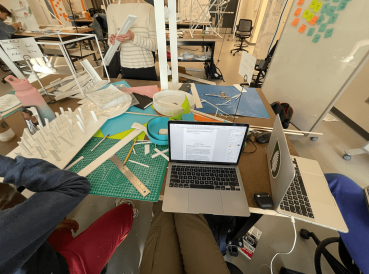 Laptops scattered on a desk in the Engineering Building!